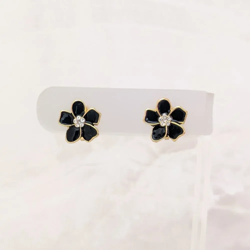 Black Enamel Small Flower Small with Clear Gem Accents Clip On Earrings